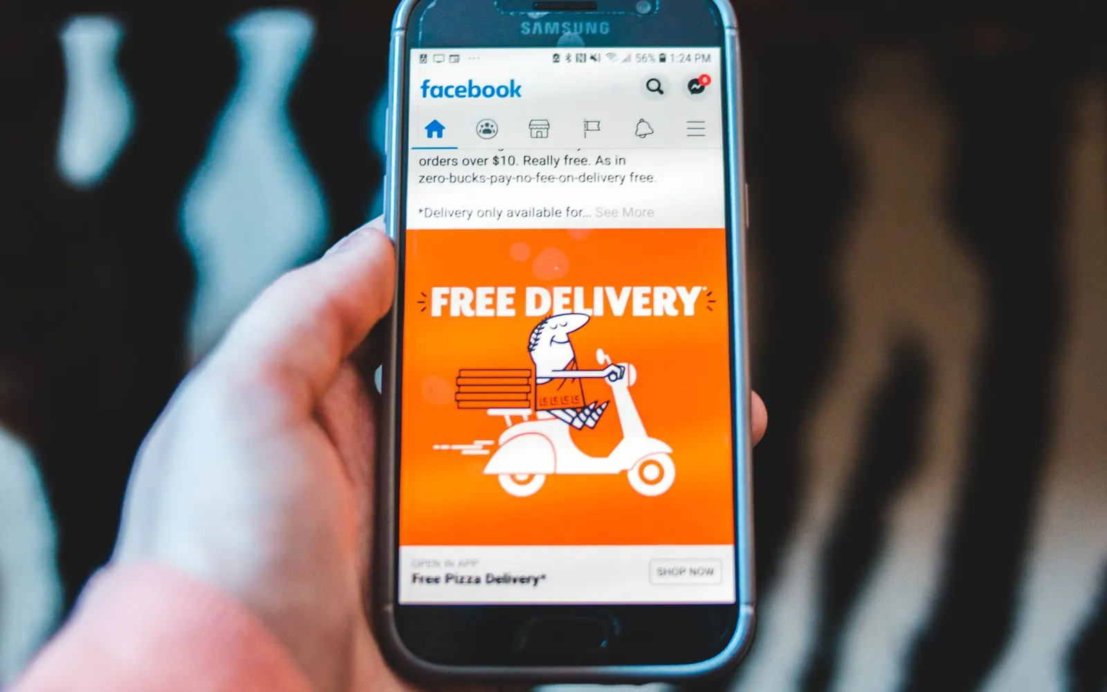 Click-to-WhatsApp ad on a smartphone