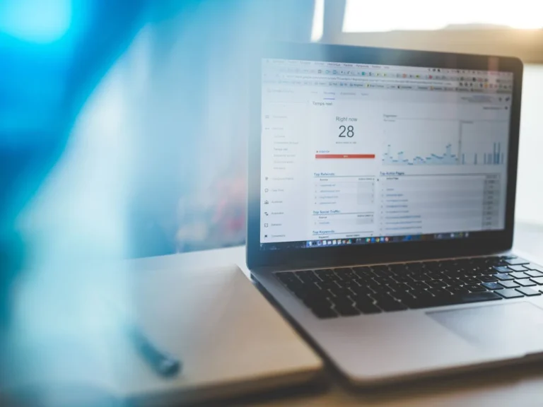 Laptop showing website traffic and analytics reports