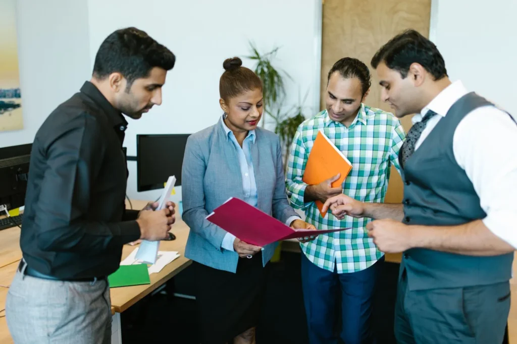 Indian business team discussing a project in the office
